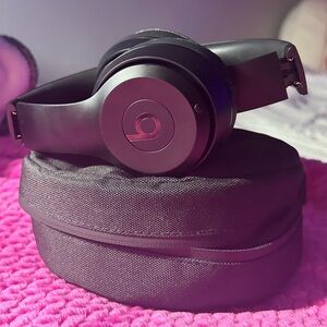Black Beats Solo3 wireless headphones.